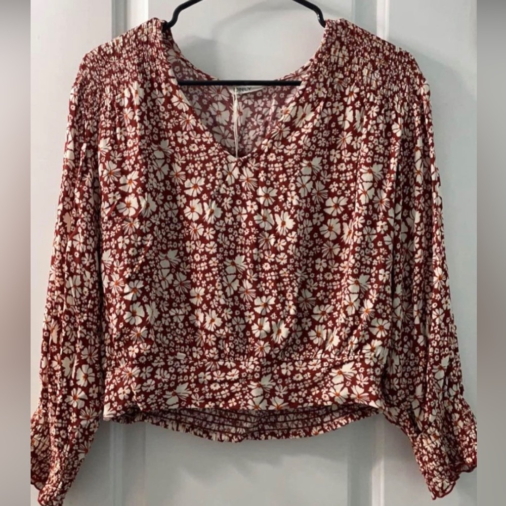 Red floral blouse